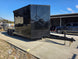 8.5' X 24' Hybrid Trailer Black With Black Out Package 7K Axles front left angled view picture 