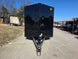 8.5' X 24' Hybrid Trailer Black With Black Out Package 7K Axles front view picture with ramp down 