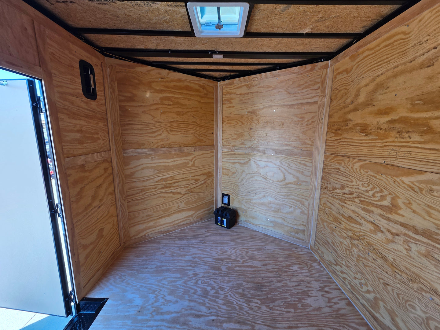 8.5' X 24' Hybrid Trailer Black With Black Out Package 7K Axles inside back straight view picture 