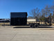 8.5' X 24' Hybrid Trailer Black With Black Out Package 7K Axles side view picture 