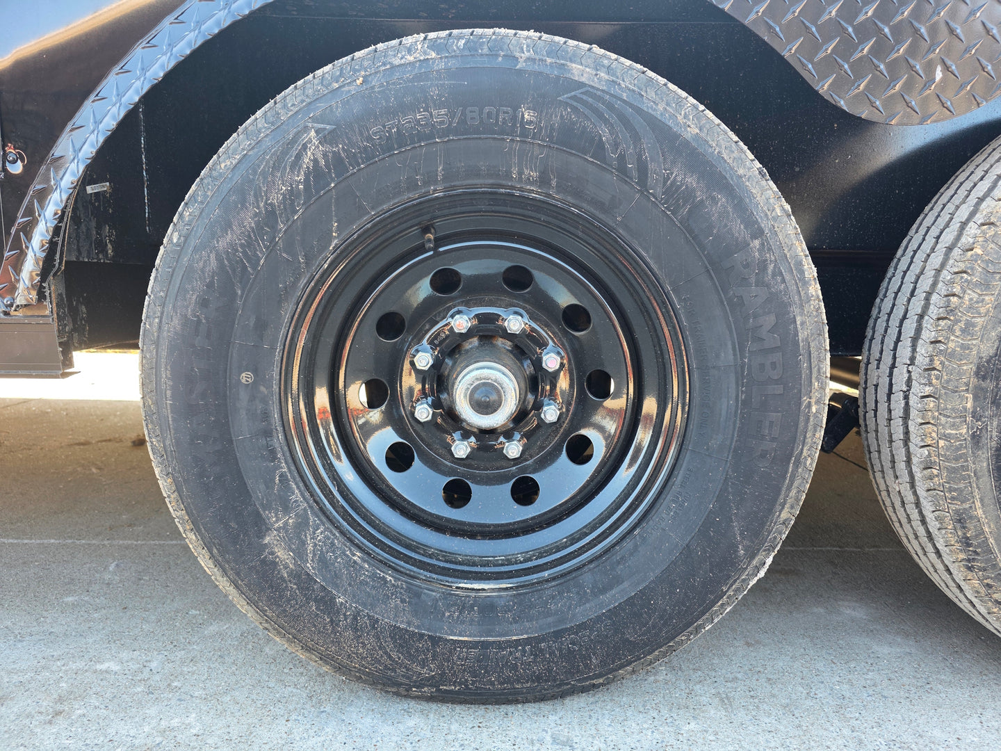 8.5' X 24' Hybrid Trailer Black With Black Out Package 7K Axles wheel and tire view picture 