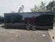 8.5' X 26' Custom Enclosed Merchandise and Marketing Trailer with Black Out Trim, lateral view.