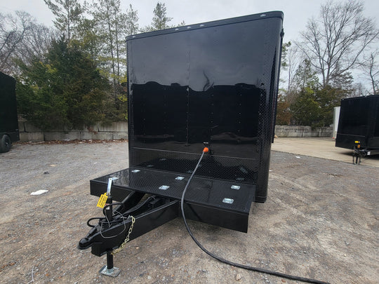 8.5' X 26' Custom Enclosed Merchandise and Marketing Trailer with Black Out Trim, Side View. 