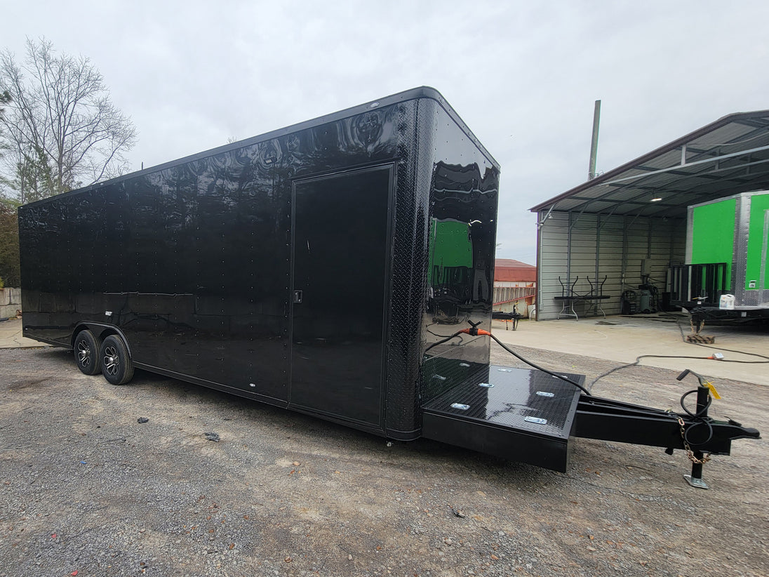 8.5' X 26' Custom Enclosed Merchandise and Marketing Trailer with Black Out Trim.