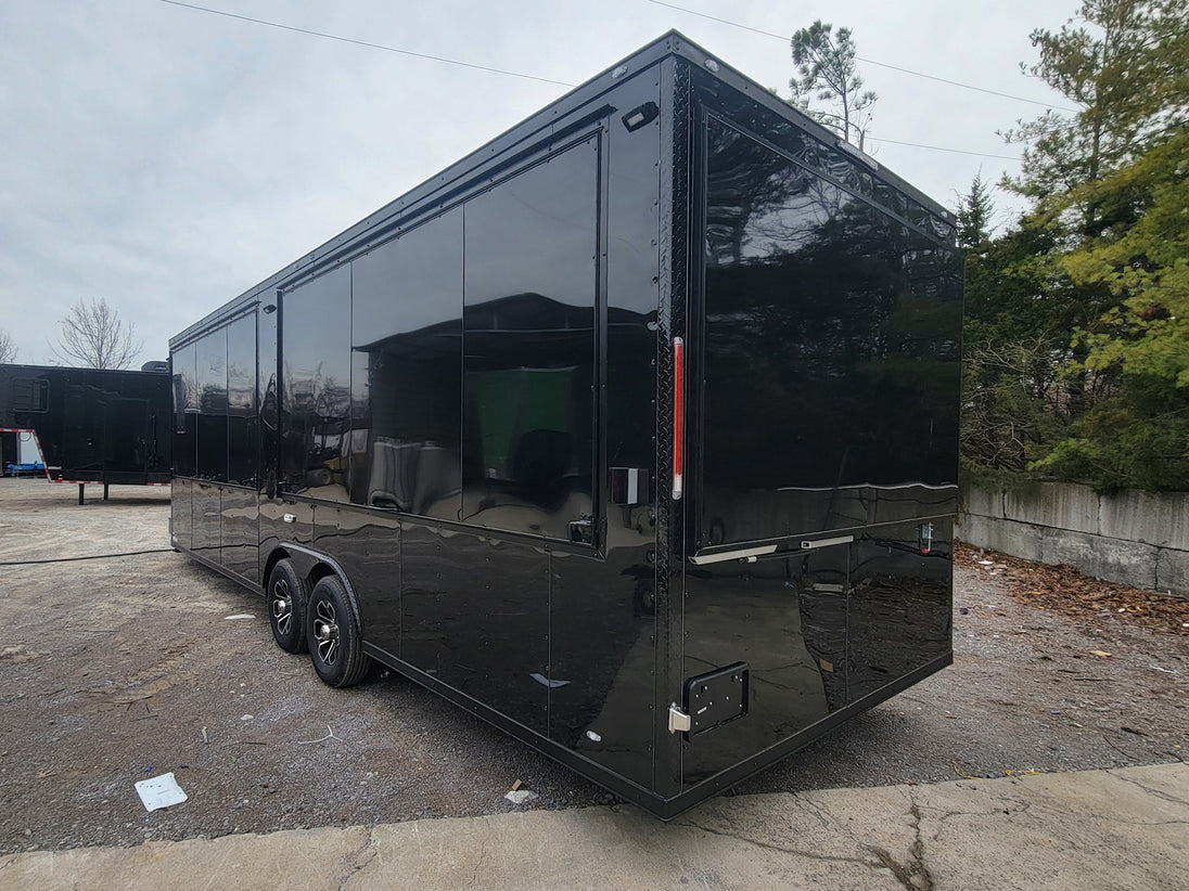 8.5' X 26' Custom Enclosed Merchandise and Marketing Trailer with Black Out Trim, Lateral View. 