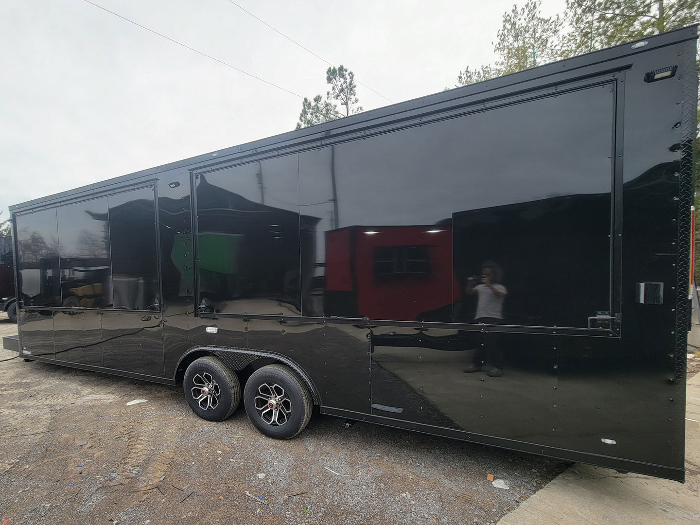 8.5' X 26' Custom Enclosed Merchandise and Marketing Trailer with Black Out Trim