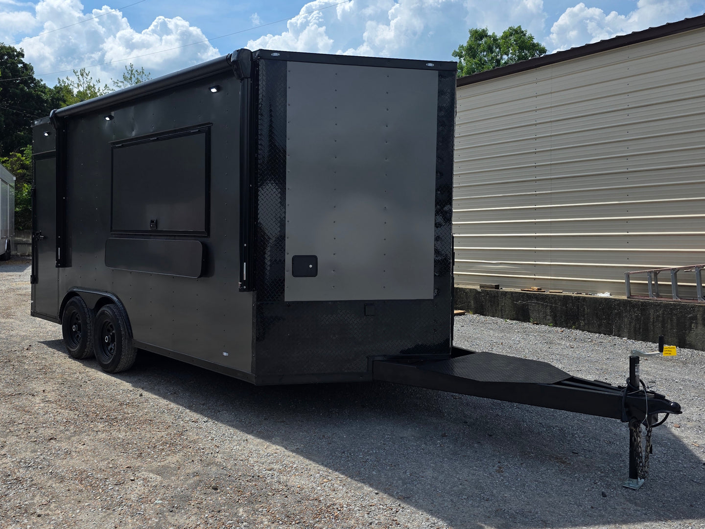 8.5'x16' Charcoal W/ Black Out Trim V-Nose Dual Awning Concession Trailer Front left angle picture 