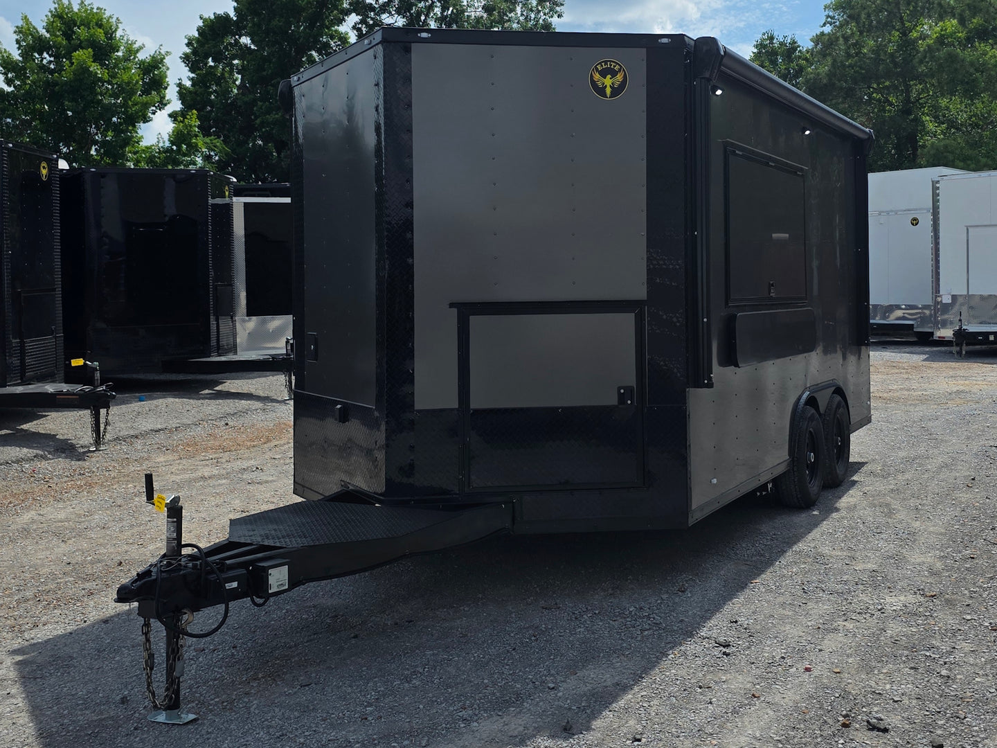 8.5'x16' Charcoal W/ Black Out Trim V-Nose Dual Awning Concession Trailer Front right angle picture 