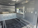 8.5'x16' Charcoal W/ Black Out Trim V-Nose Dual Awning Concession Trailer Interior back left angle picture 