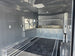 8.5'x16' Charcoal W/ Black Out Trim V-Nose Dual Awning Concession Trailer Interior back right-angle picture 