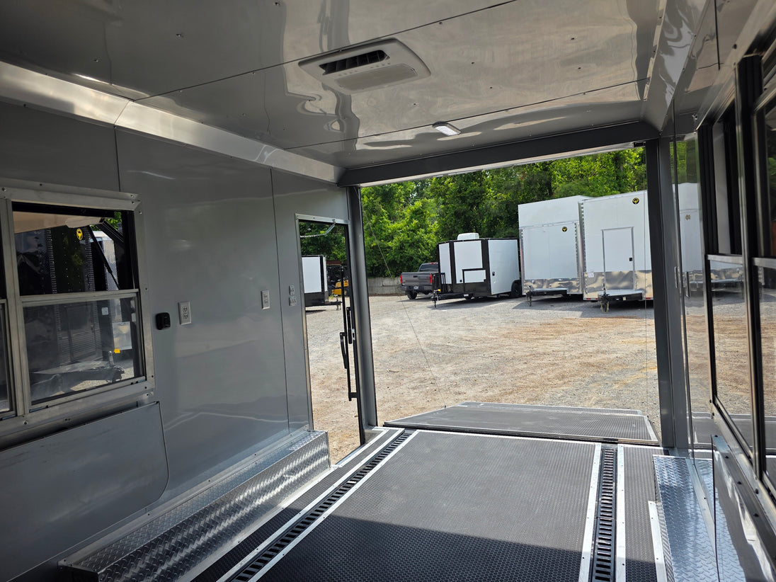 8.5'x16' Charcoal W/ Black Out Trim V-Nose Dual Awning Concession Trailer Interior front right angle picture 