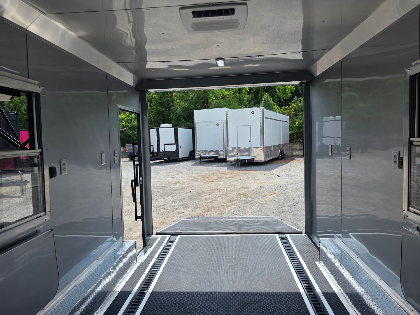 8.5'x16' Charcoal W/ Black Out Trim V-Nose Dual Awning Concession Trailer Interior front side picture 