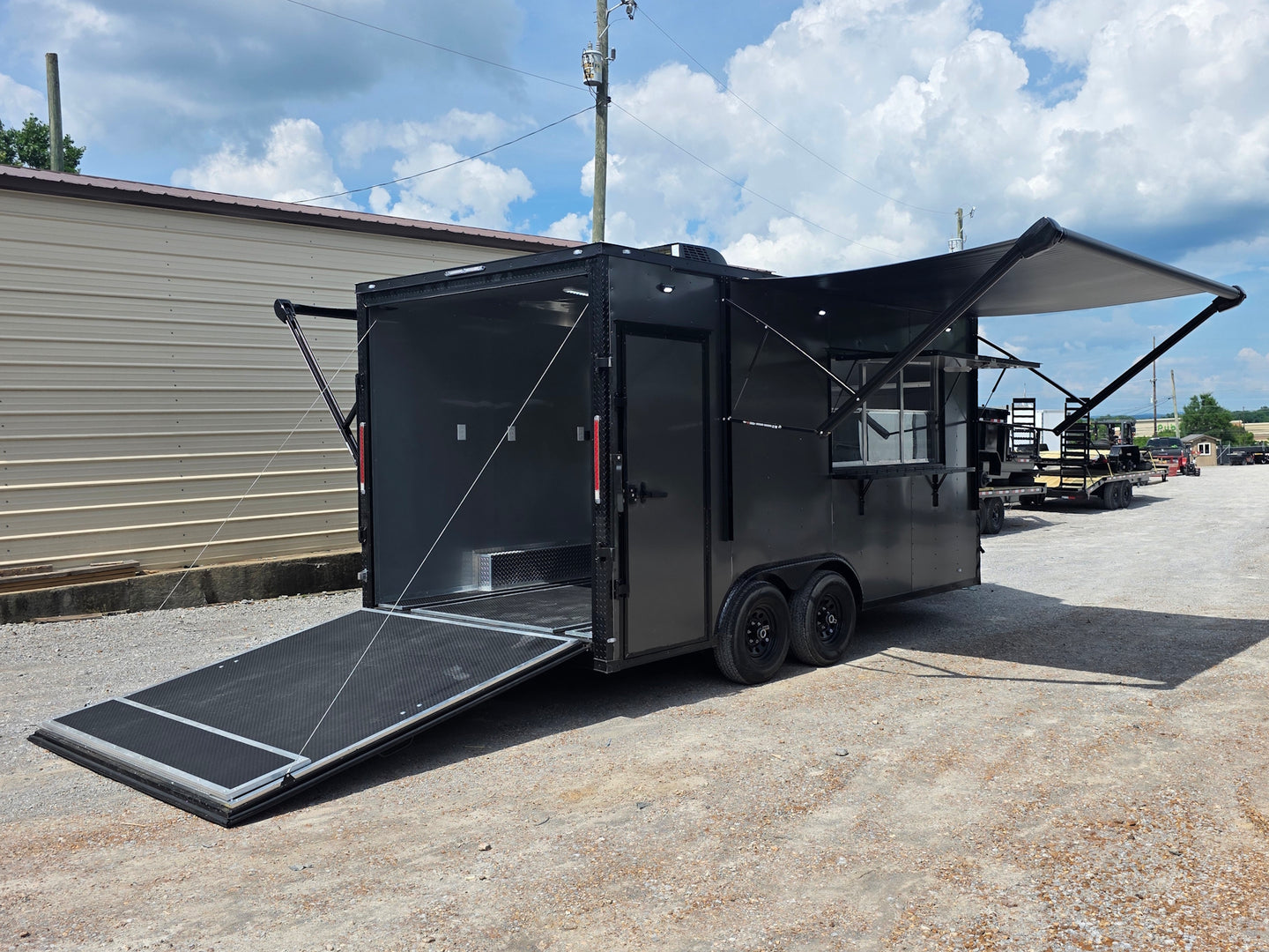8.5'x16' Charcoal W/ Black Out Trim V-Nose Dual Awning Concession Trailer Open back right angle picture 
