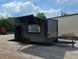 8.5'x16' Charcoal W/ Black Out Trim V-Nose Dual Awning Concession Trailer Open front left angle picture 