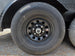 8.5'x16' Charcoal W/ Black Out Trim V-Nose Dual Awning Concession Trailer Wheel picture 