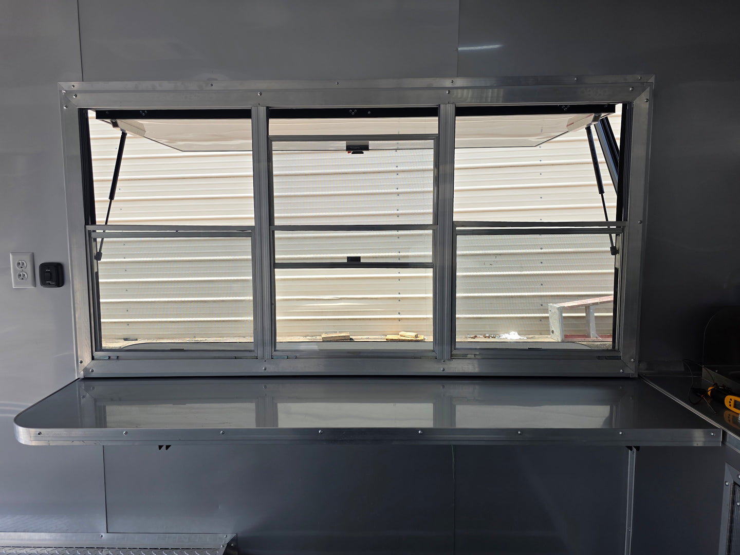 8.5'x16' Charcoal W/ Black Out Trim V-Nose Dual Awning Concession Trailer Window picture 