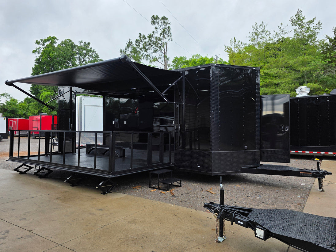 8.5'x24' Black Custom Event Stage Trailer w/ 16' Fold-Down Stage Open front left-angle picture 