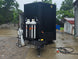8.5'x28' Black w/ Black out trim Concession Trailer with Porch Package Front side picture 