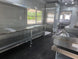8.5'x28' Black w/ Black out trim Concession Trailer with Porch Package Open front right angle picture 
