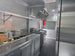 8.5'x28' Black w/ Black out trim Concession Trailer with Porch Package Interior back left angle picture 