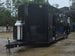 8.5'x28' Black w/ Black out trim Concession Trailer with Porch Package Open front right angle picture 