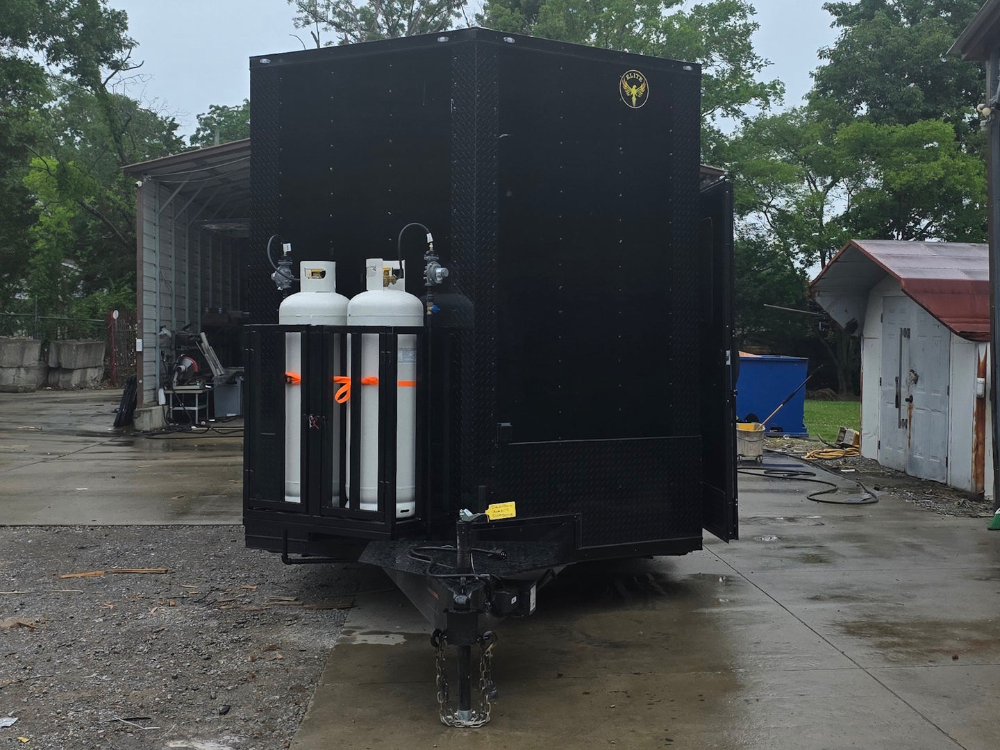8.5'x28' Black w/ Black out trim Concession Trailer with Porch Package Open front side picture 