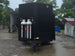 8.5'x28' Black w/ Black out trim Concession Trailer with Porch Package Open front side picture 