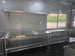 8.5'x28' Black w/ Black out trim Concession Trailer with Porch Package Shelves picture 