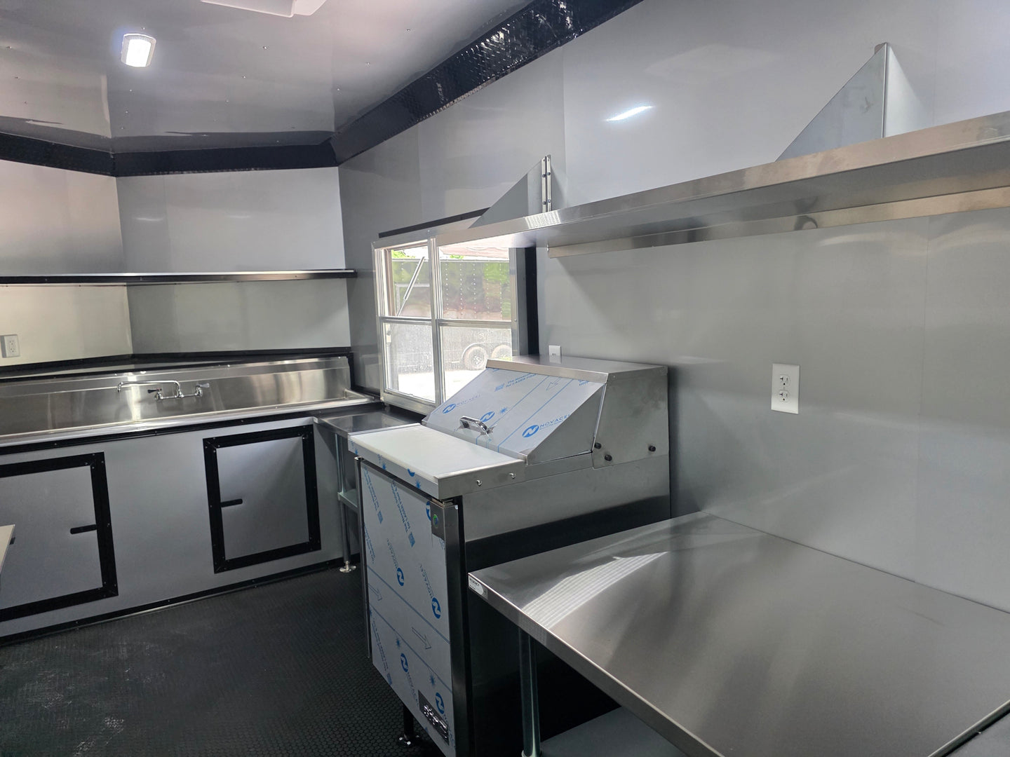 8.5' x 16' Mobile Food Vending Concession Trailer Interior back left angle picture 
