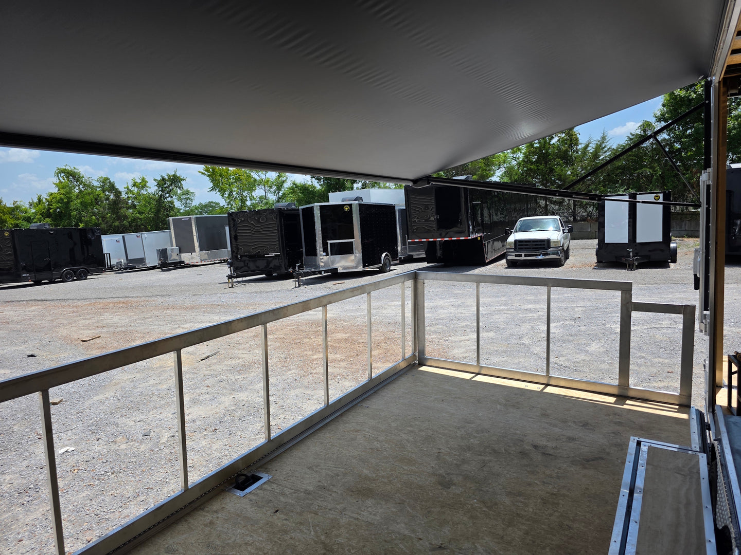 8.5' x 20' White Mobile Stage Trailer Porch front right angle picture 