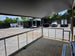 8.5' x 20' White Mobile Stage Trailer Porch front right angle picture 