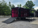 8.5' x 22' Black Deckover Mobile Stage Trailer with Blackout Package Open back right-angle picture 