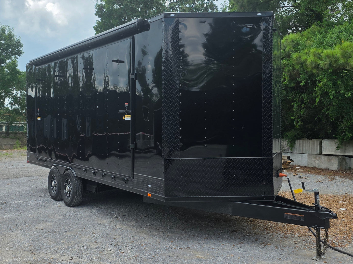 8.5' x 22' Black Deckover Mobile Stage Trailer with Blackout Package open front left angle picture 