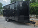 8.5' x 22' Black Deckover Mobile Stage Trailer with Blackout Package open front left angle picture 
