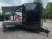 8.5' x 22' Black Deckover Mobile Stage Trailer with Blackout Package Open front left angle picture 