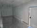8.5 x 32' Gooseneck King Pin Fifth Wheel Trailer 3-10K axles Interior front left angle picture 