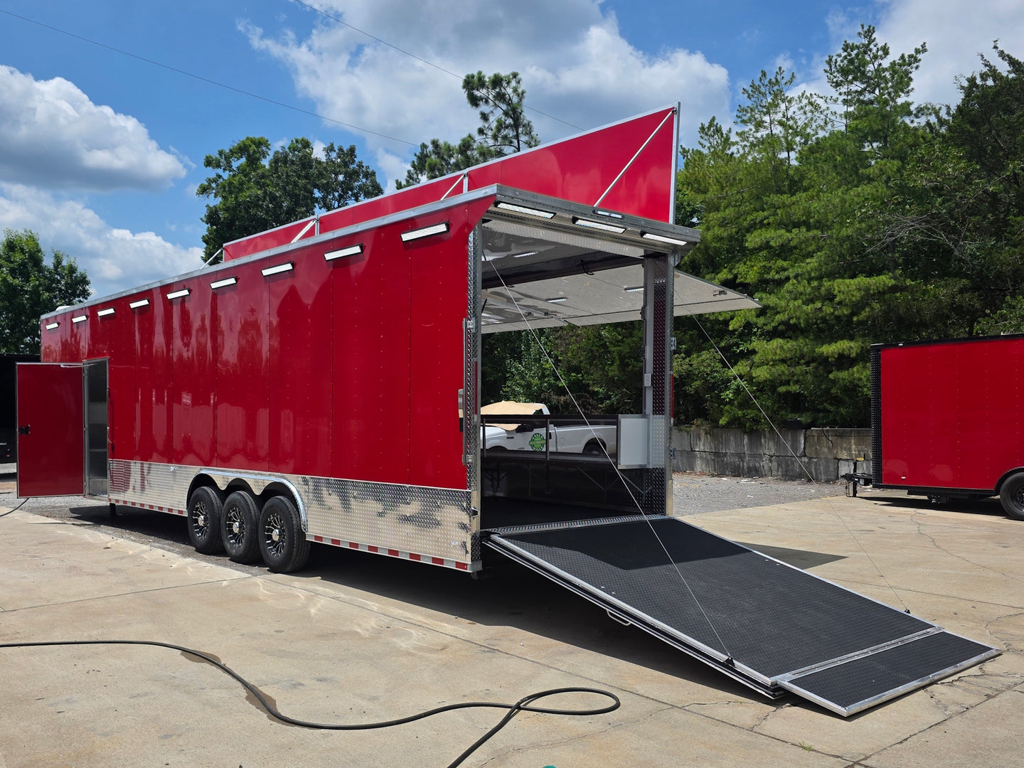 8.5' x 40' Gooseneck Display Merchandise Concession Trailer Open back left angle picture 