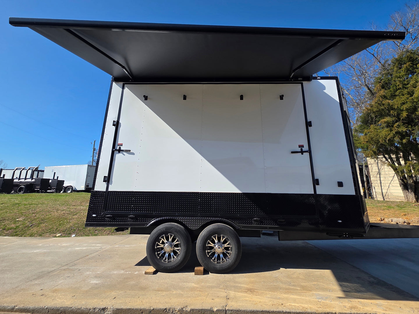 8.5x16 white w/ blackout stage Canopy open left side picture 