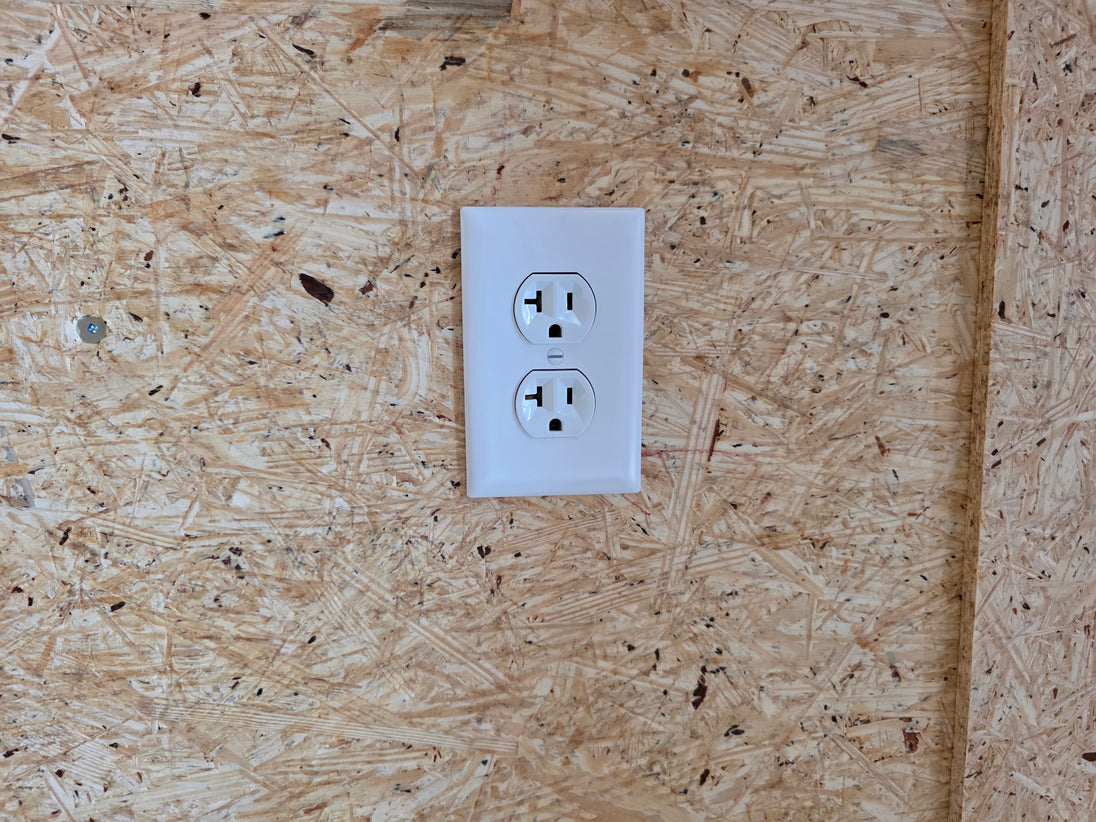 8.5x16 white w/ blackout stage  electrical outlet picture 