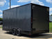 8.5x20 Charcoal Enclosed Trailer with Blackout Package (2) 5200lb Axles Storage Back left angle picture 
