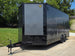 8.5x20 Charcoal Enclosed Trailer with Blackout Package (2) 5200lb Axles Storage Front right angle picture 