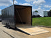 8.5x20 Charcoal Enclosed Trailer with Blackout Package (2) 5200lb Axles Storage Open back left angle picture 