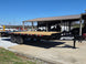 8.5x20 I Beam Deck over Dovetail Equipment Trailer 2-7k Axles with King Kong Ramps Front left angle picture 