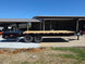 8.5x20 I Beam Deck over Dovetail Equipment Trailer 2-7k Axles with King Kong Ramps Left side picture 