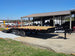 8.5x20 I Beam Deck over Dovetail Equipment Trailer 2-7k Axles with King Kong Ramps Open front left angle picture 