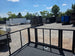 8.5x24 Black Stage trailer-34619 Back stage back right angle picture 