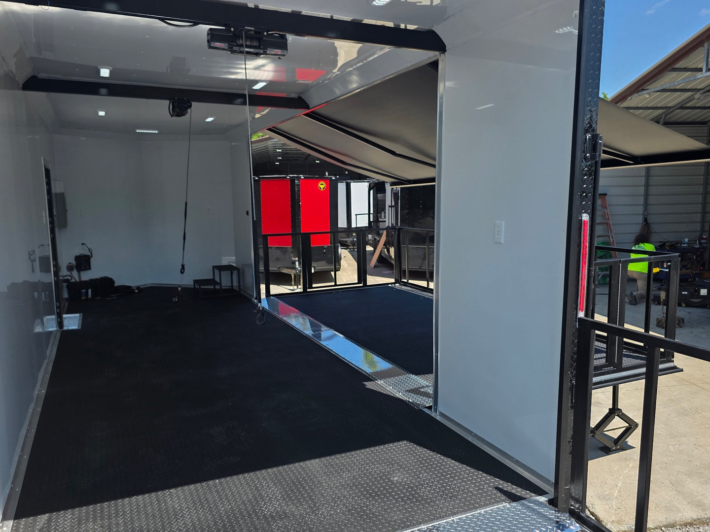 8.5x24 Black Stage trailer-34619 Back stage front left angle picture 