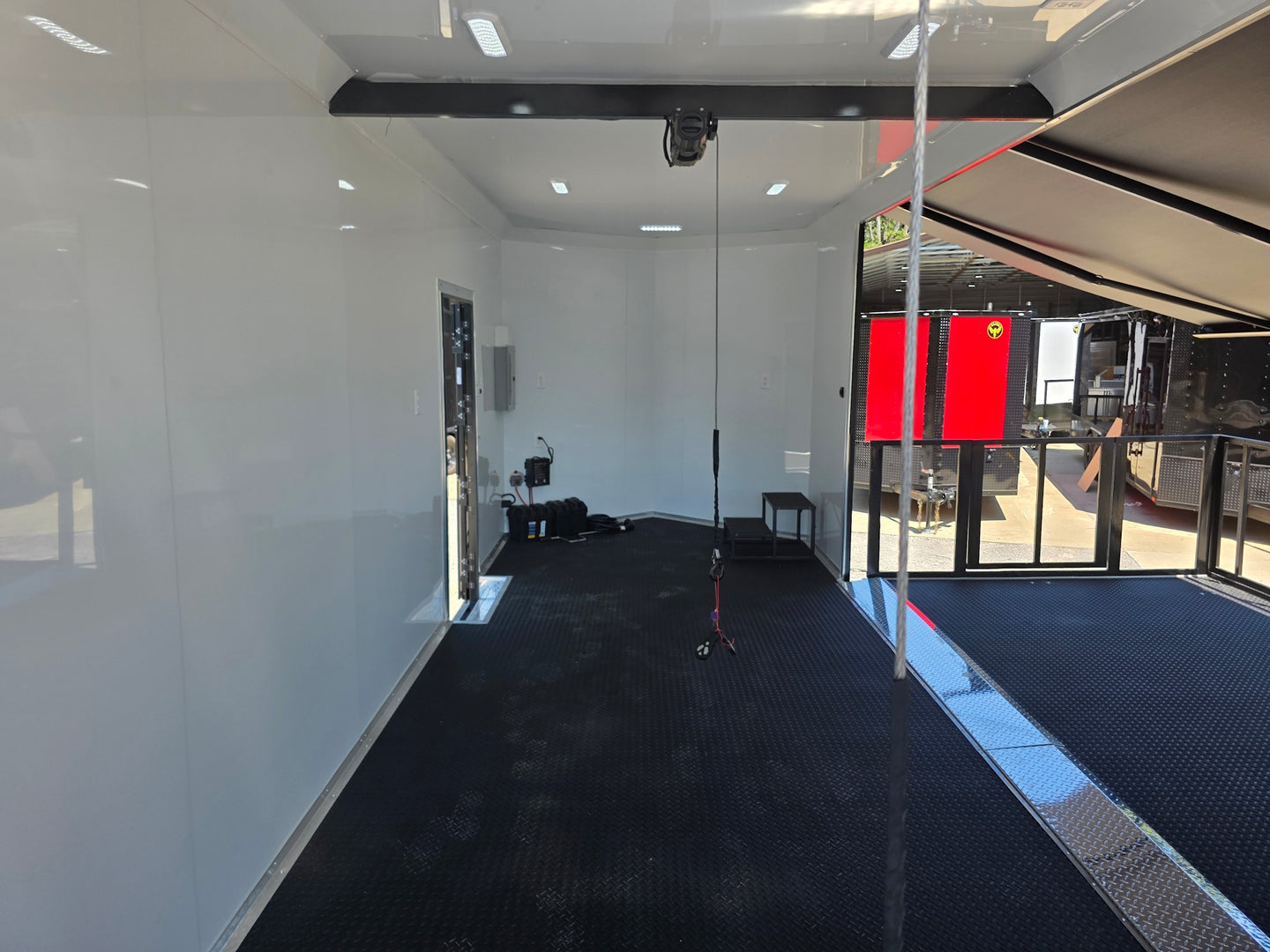 8.5x24 Black Stage trailer-34619 Interior back side picture 
