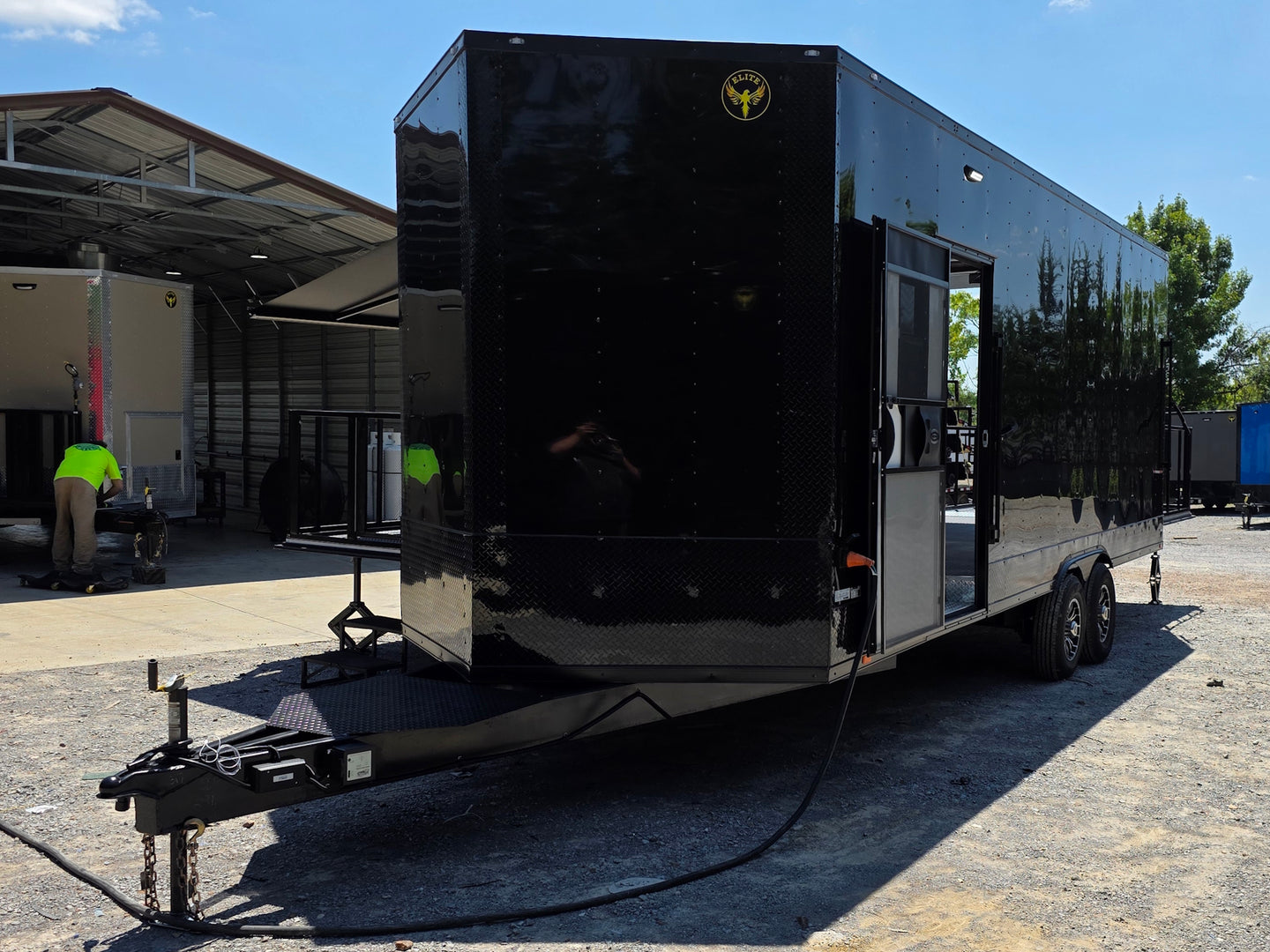 8.5x24 Black Stage trailer-34619 Open front right angle picture 