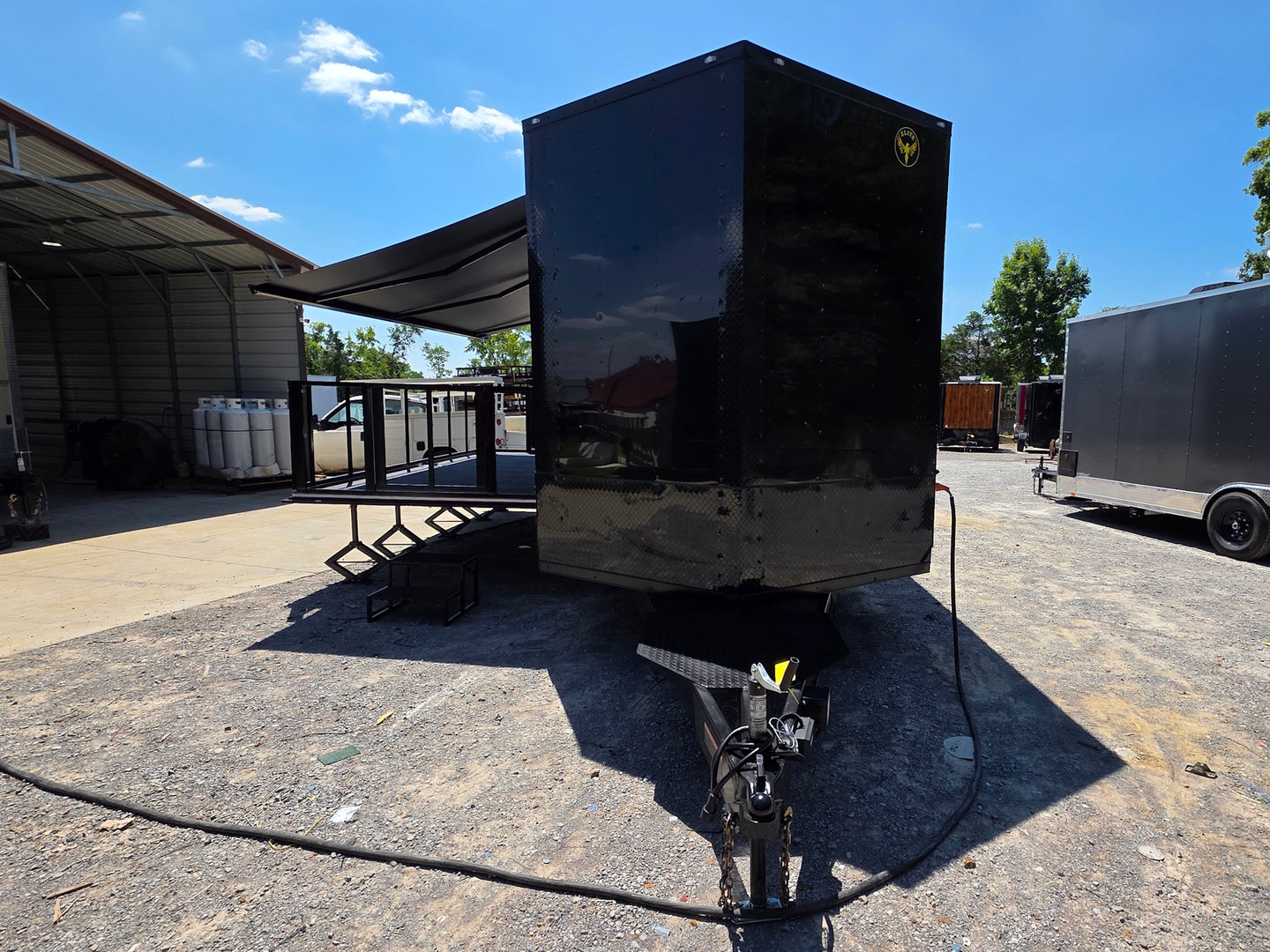8.5x24 Black Stage trailer-34619 Open front side picture 